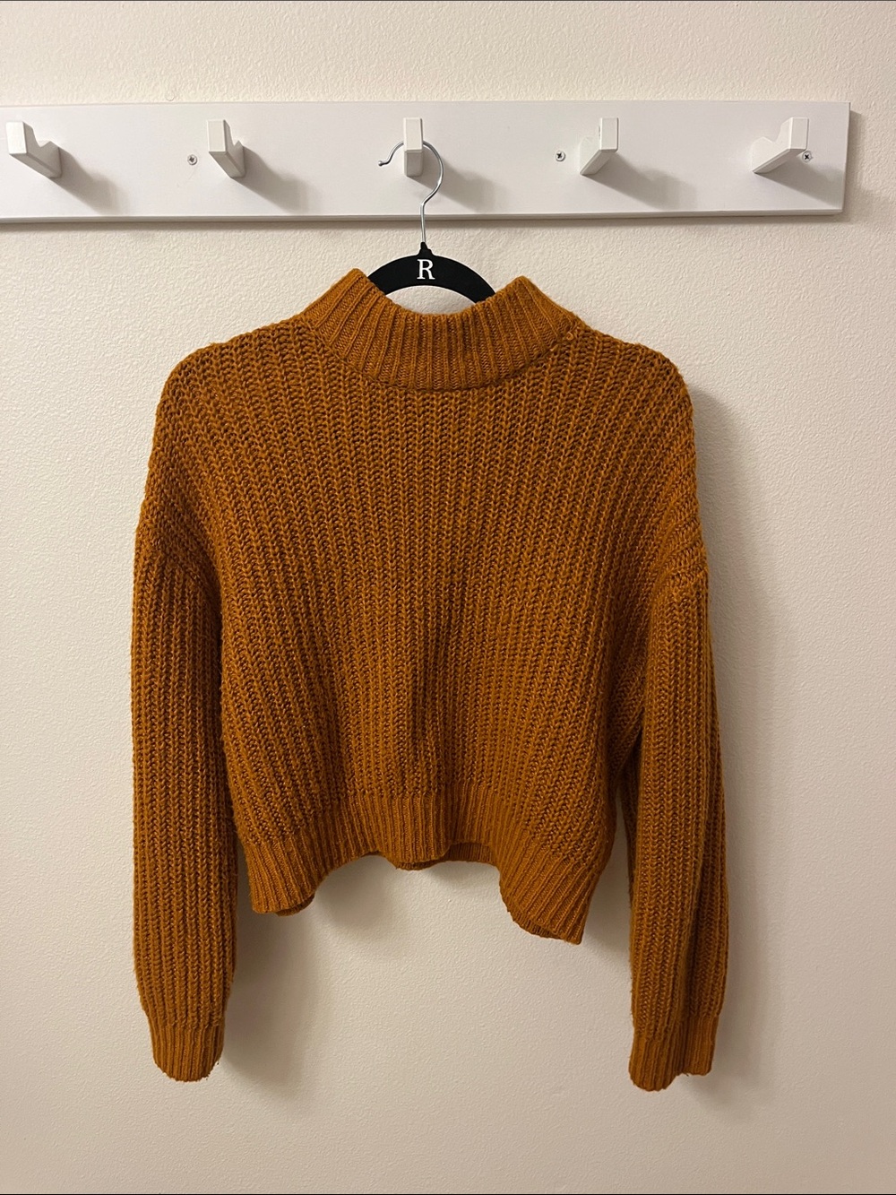 Orange cable knit turtleneck